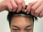 男性かつらモデル画像。装着中
